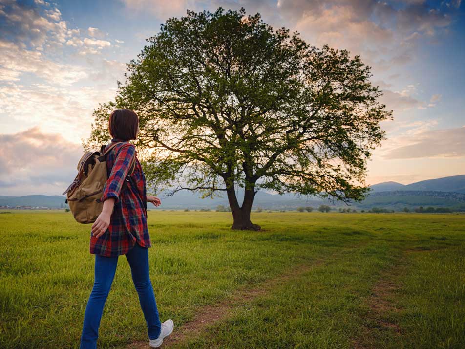 asian-traveler-woman-walk-on-the-durty-road-with-s-2025-01-16-10-59-56-utc